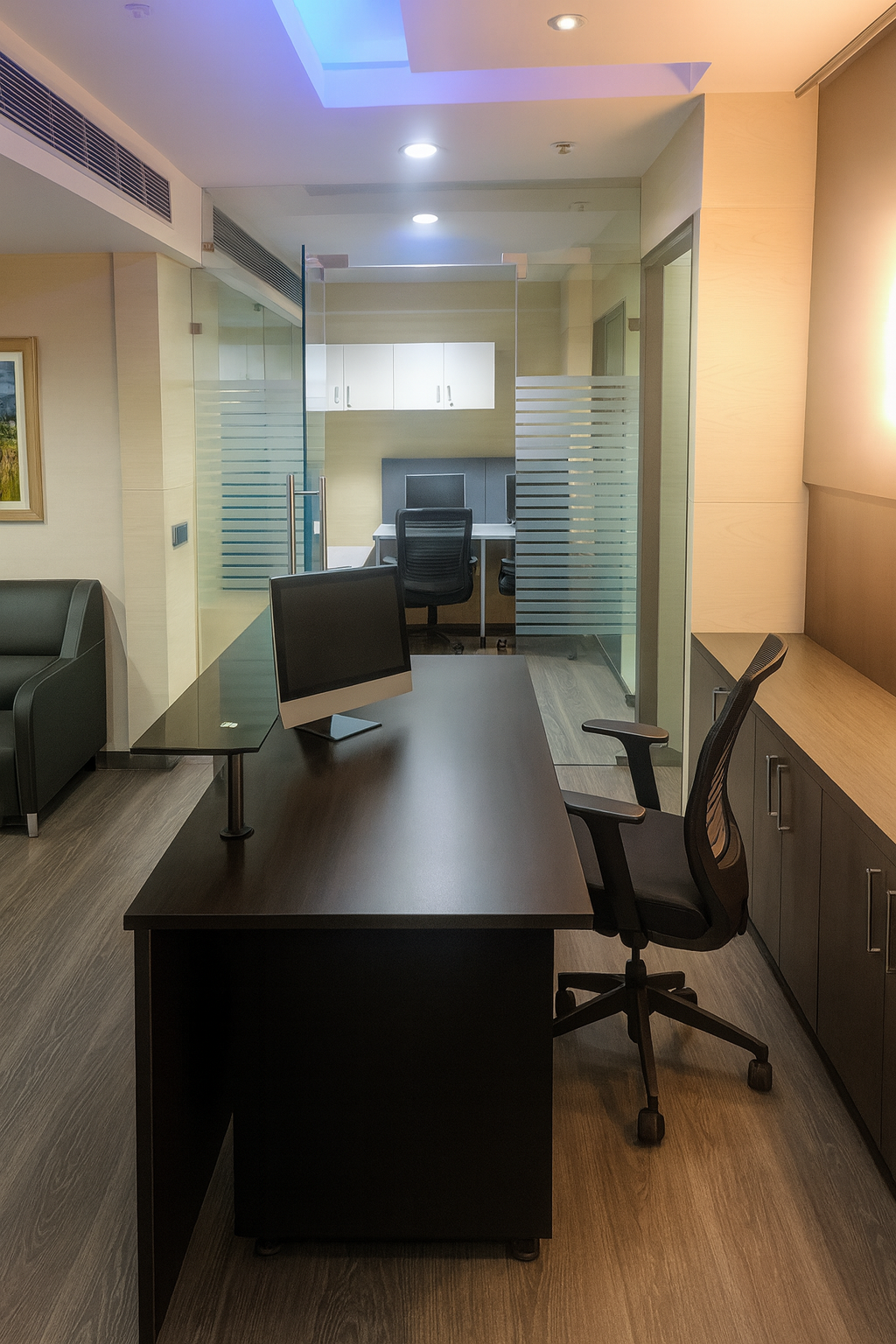 Furnished executive cabin with glass partitions and LED lighting at Le Meridien 7th floor office